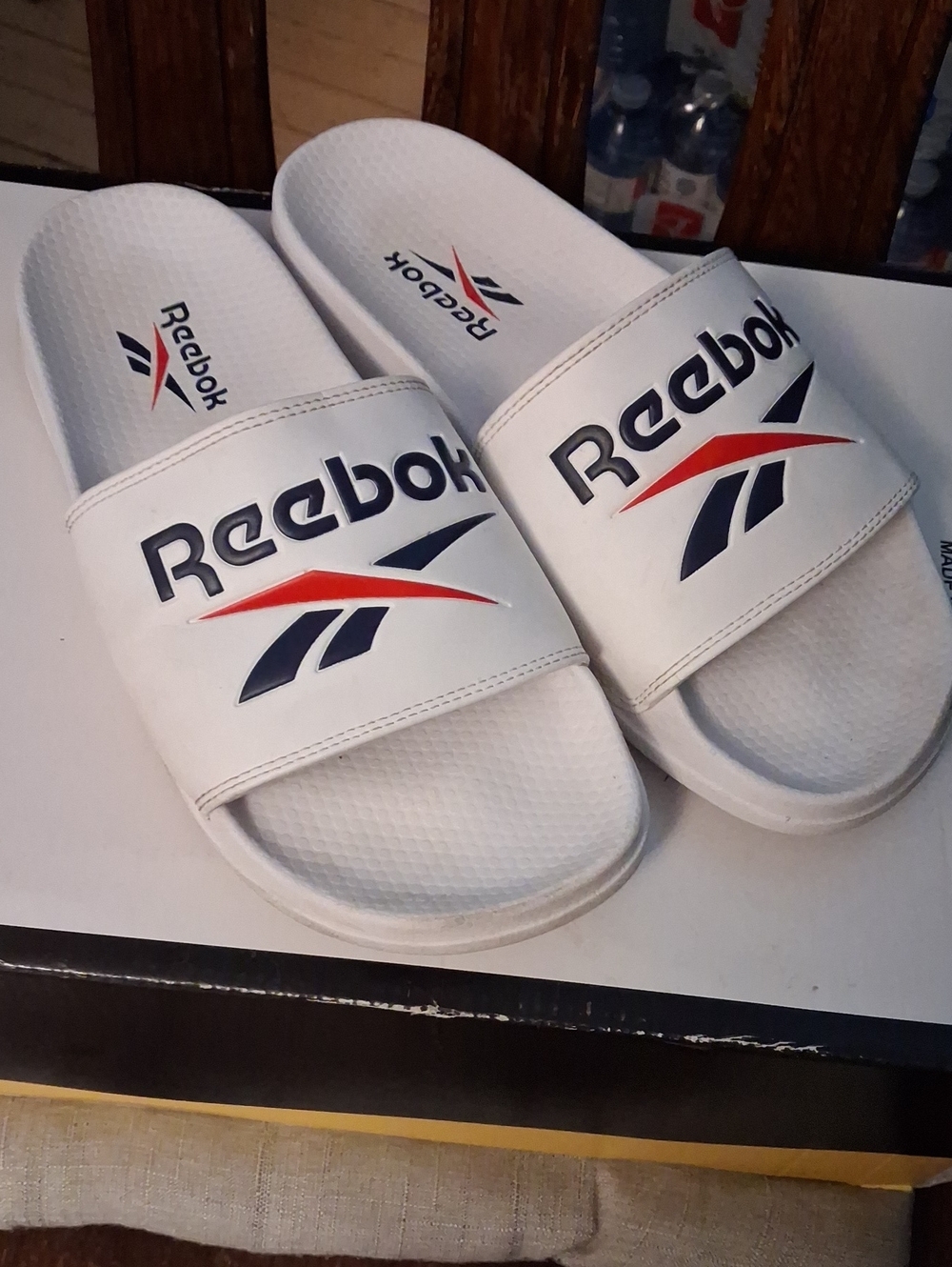 Reebok White Men’s Slide Sandals with Navy & Red Logo Accents